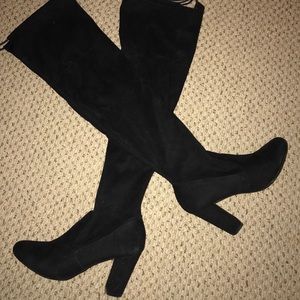 Thigh high black boots